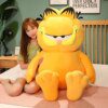 peluche chat en colère Garfield , animal Disney, peau de tigre paresseuse